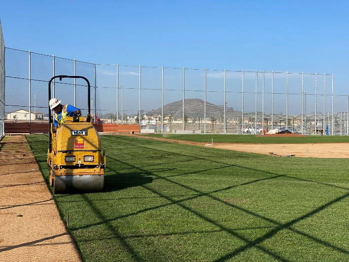 Big roll installation at Liberty High School baseball field